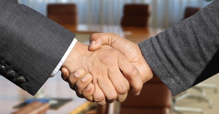 1.11.19 shaking hands stock image.jpg